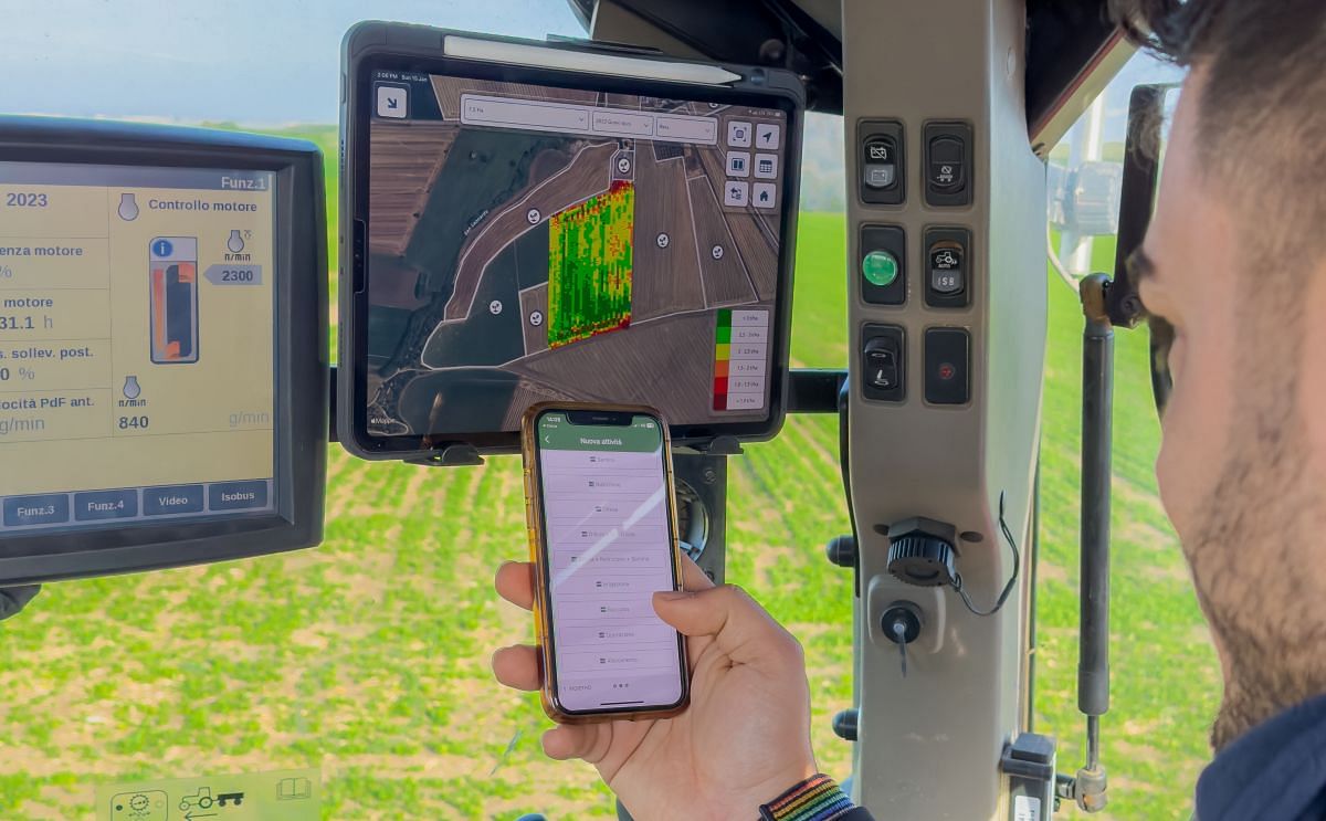 A farmer views xFarm and FieldView data from his cab